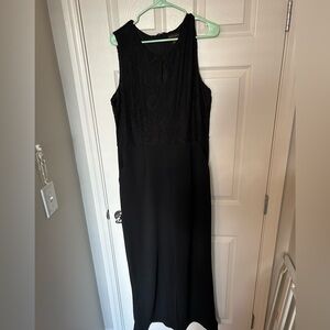 Jumpsuit with floral design on chest worn once